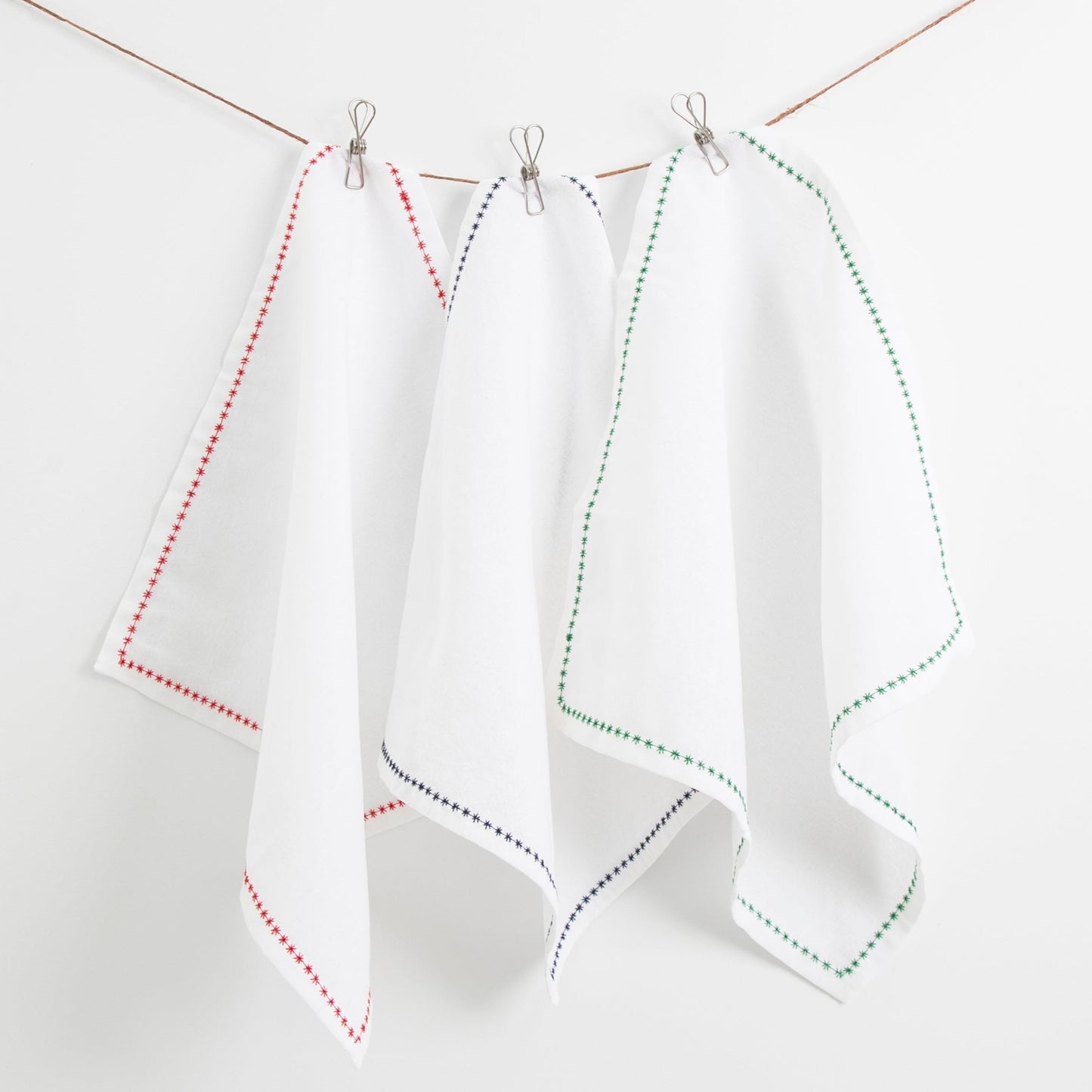 white cotton napkins with decorative trim