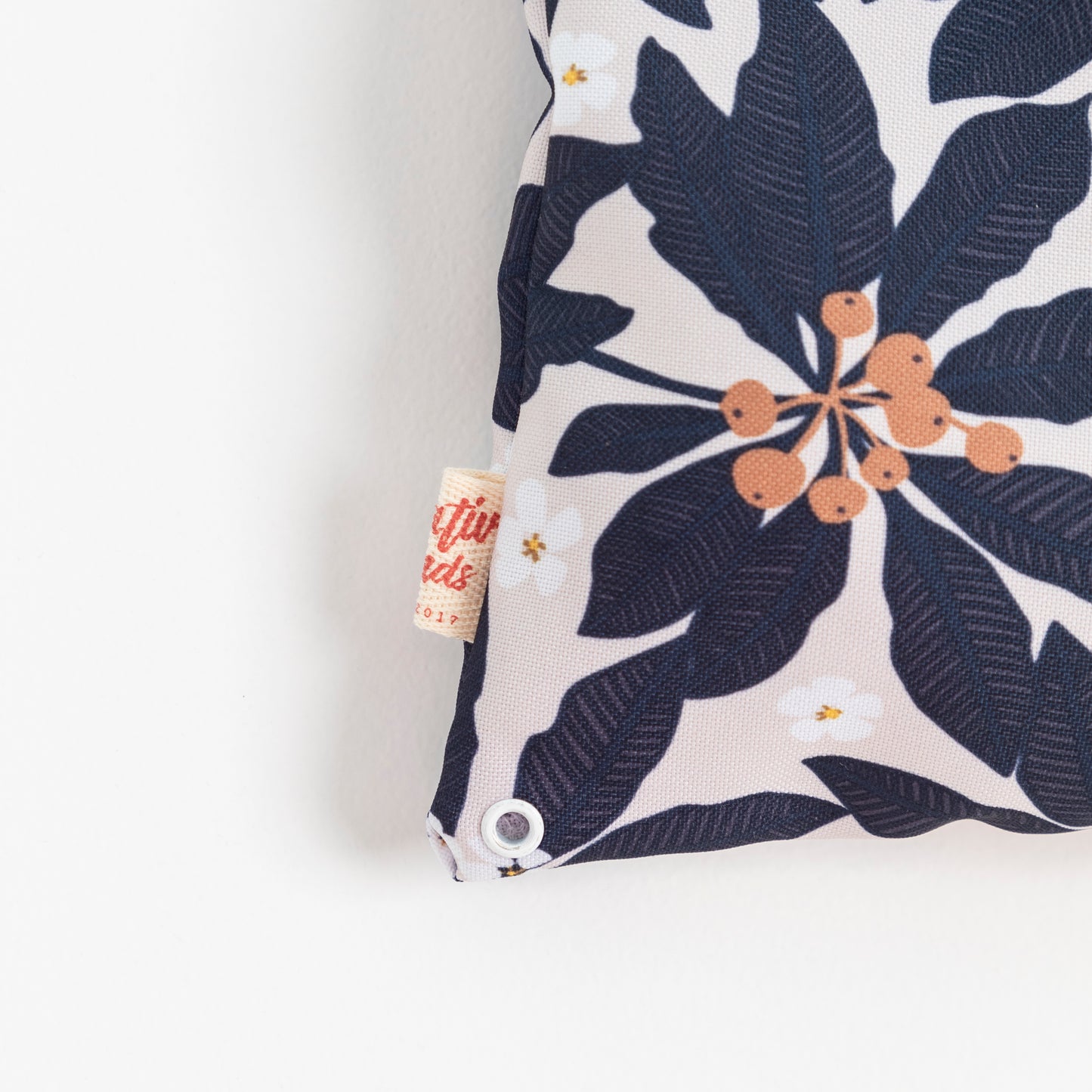 close up of the rivet on the peg bag in the Pittosporum fabric