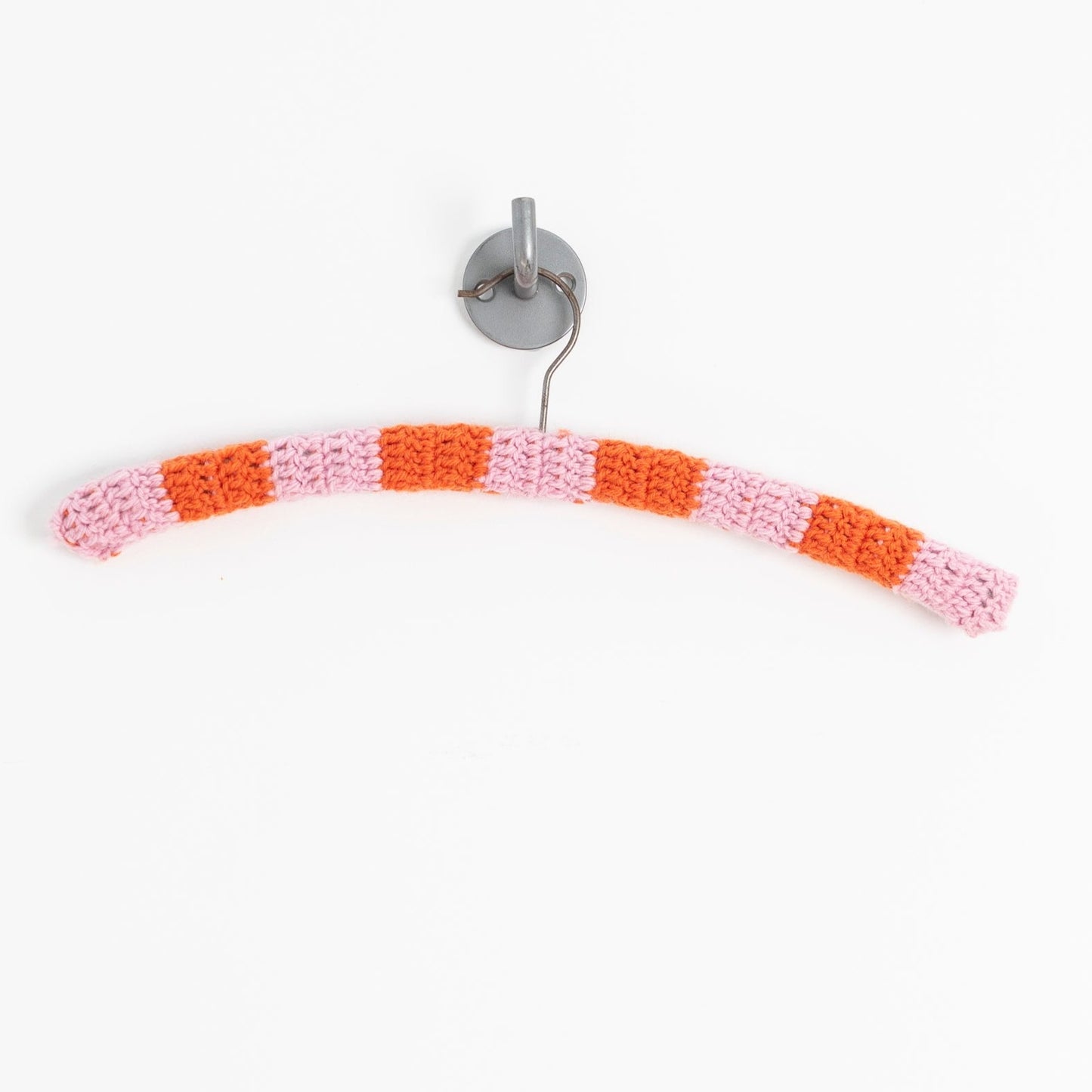 pink & orange woollen crochet coat hanger