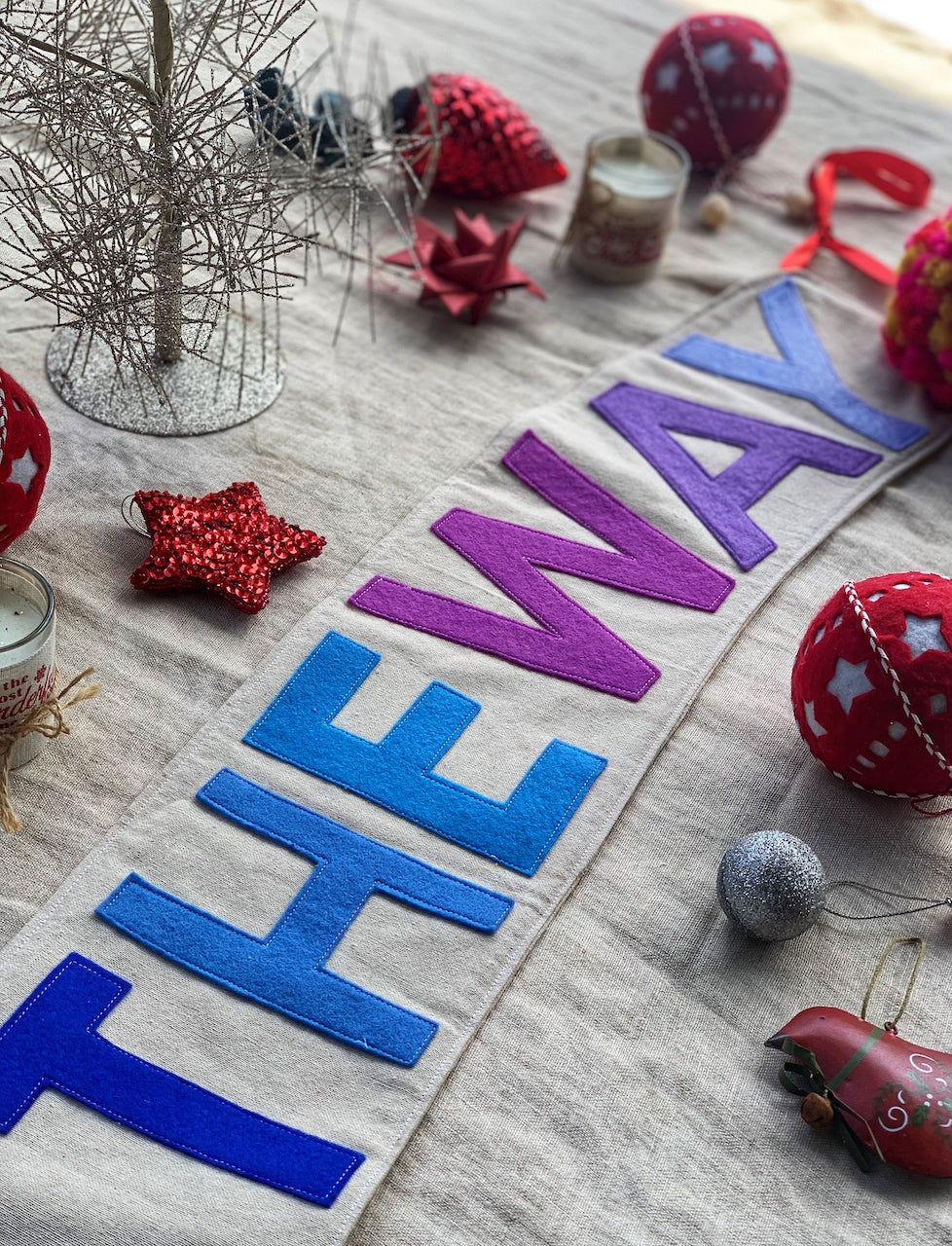Jingle All The Way banner up close on table