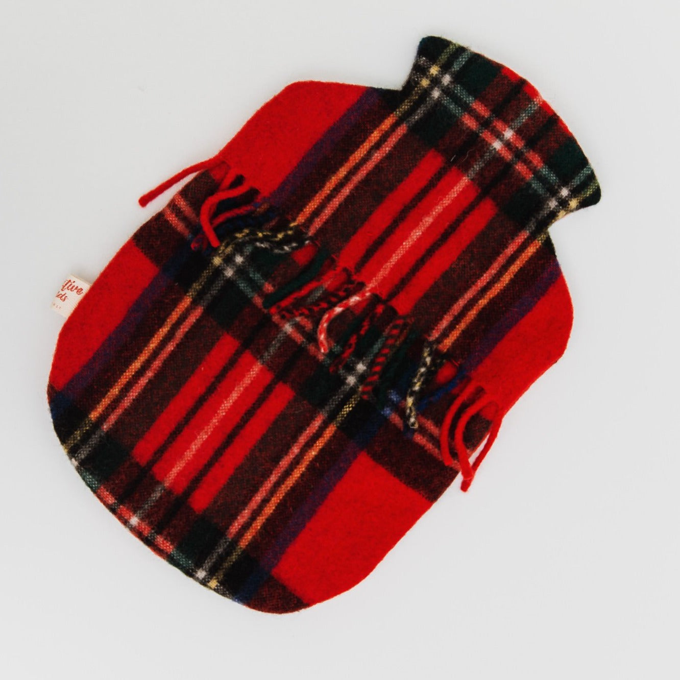 red & black woollen hot water bottle cover with fringing