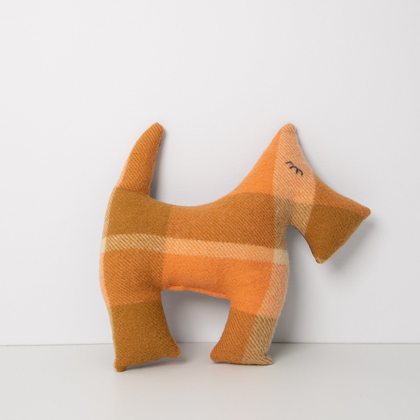 Peach Blanket up-cycled to make this Scotty Dog, standing on white background