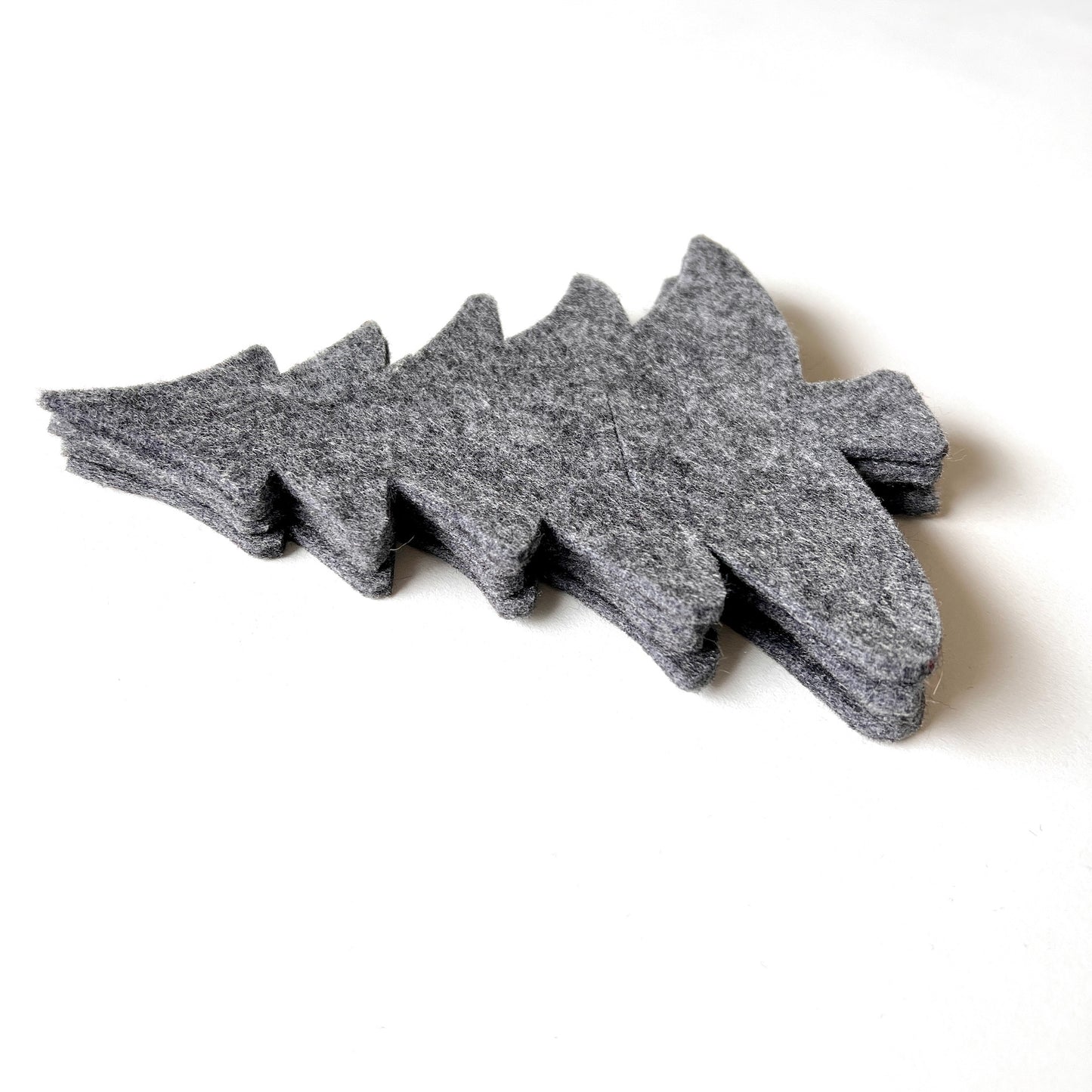 grey felt christmas trees - set four