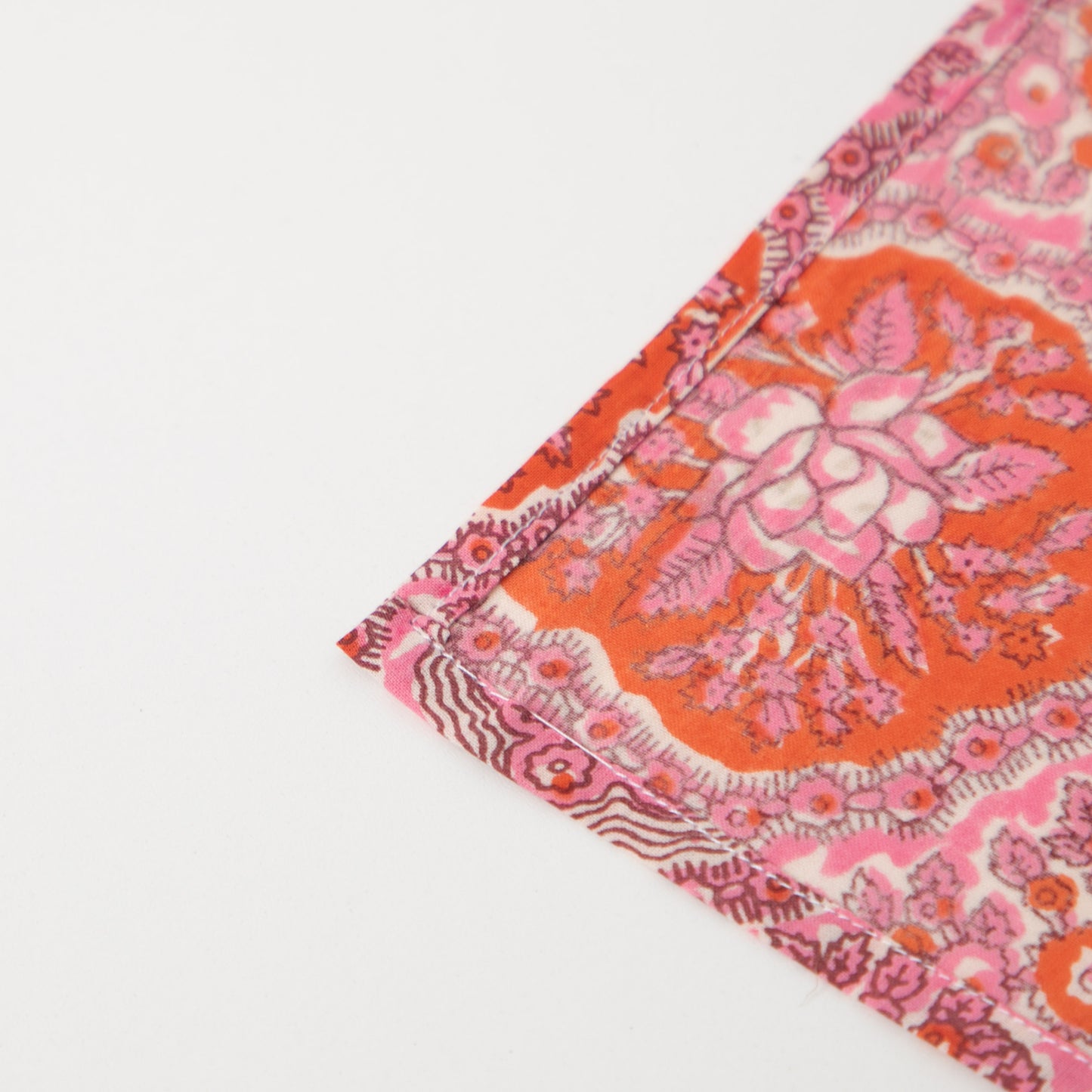 reverse corner of pink napkin