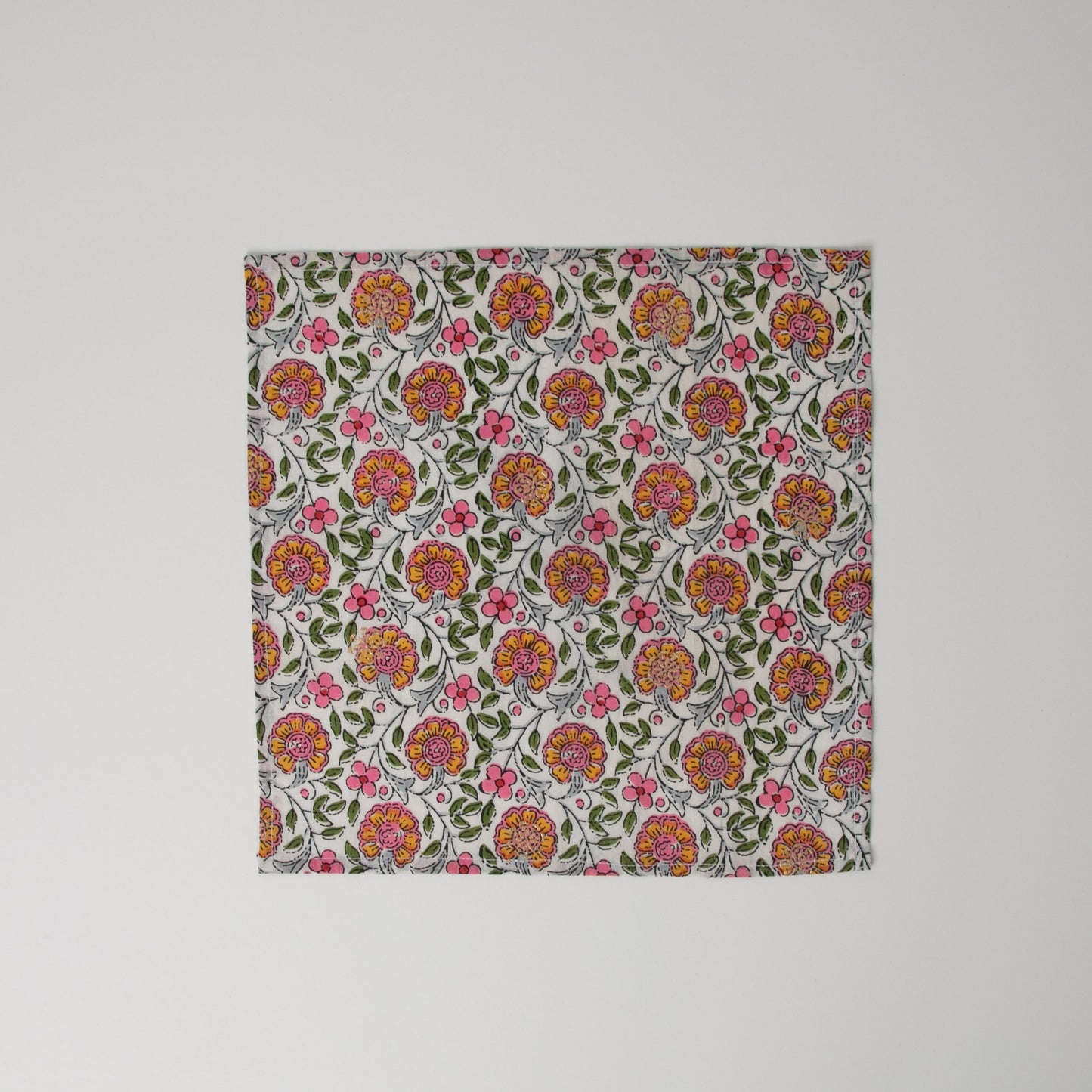 1 x square floral cotton napkin, sitting flat on white background