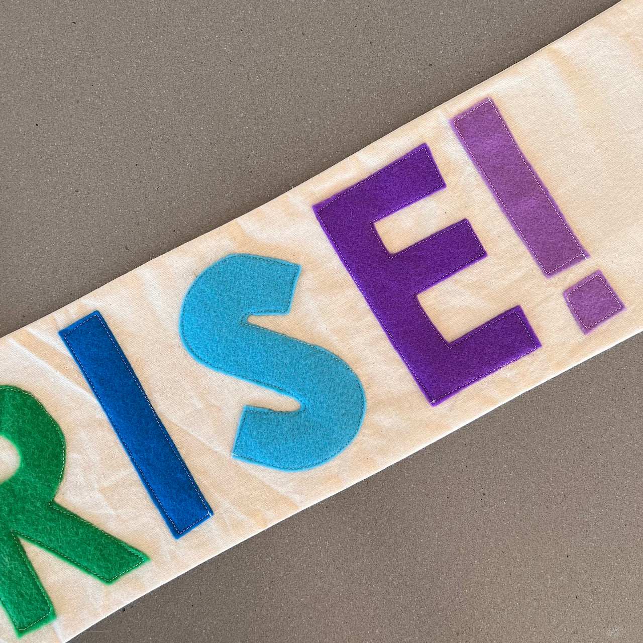 Close Up of Felt Letters - Surprise Banner