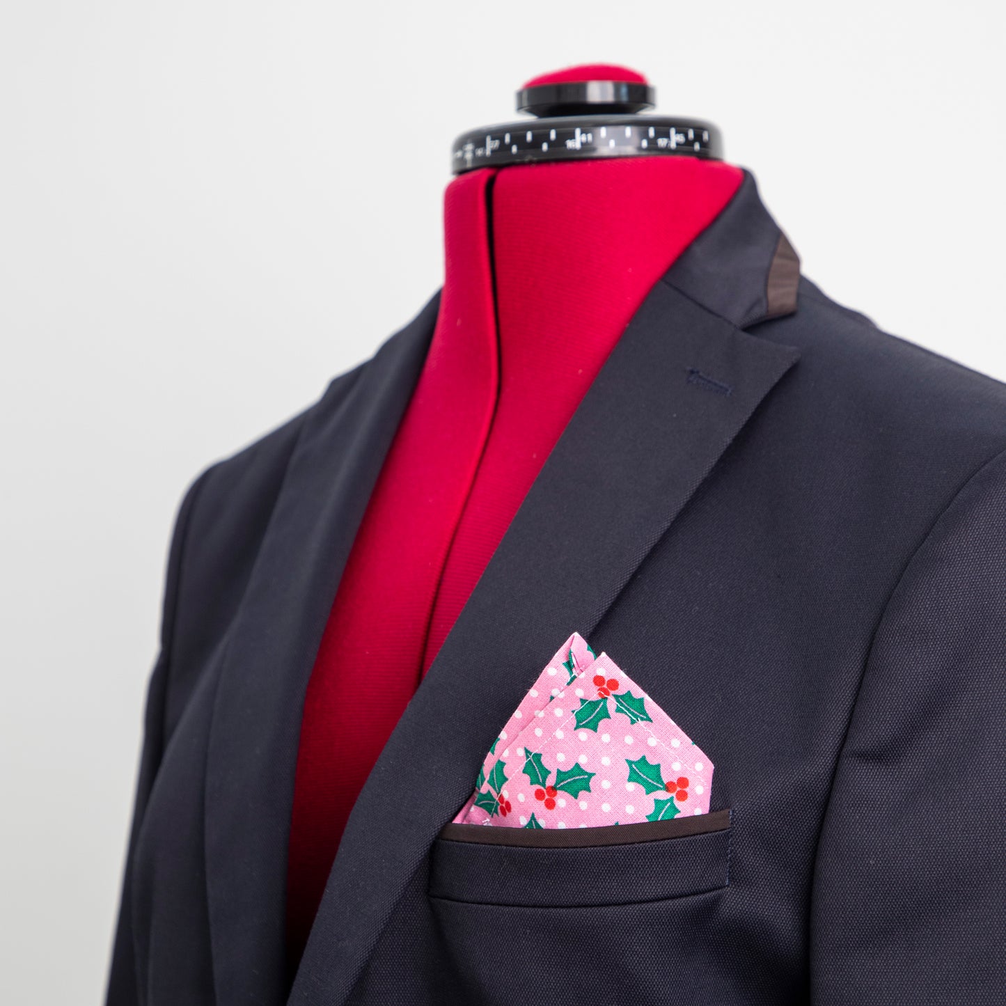 
                  
                    pink holly xmas pocket square in blazer pocket
                  
                