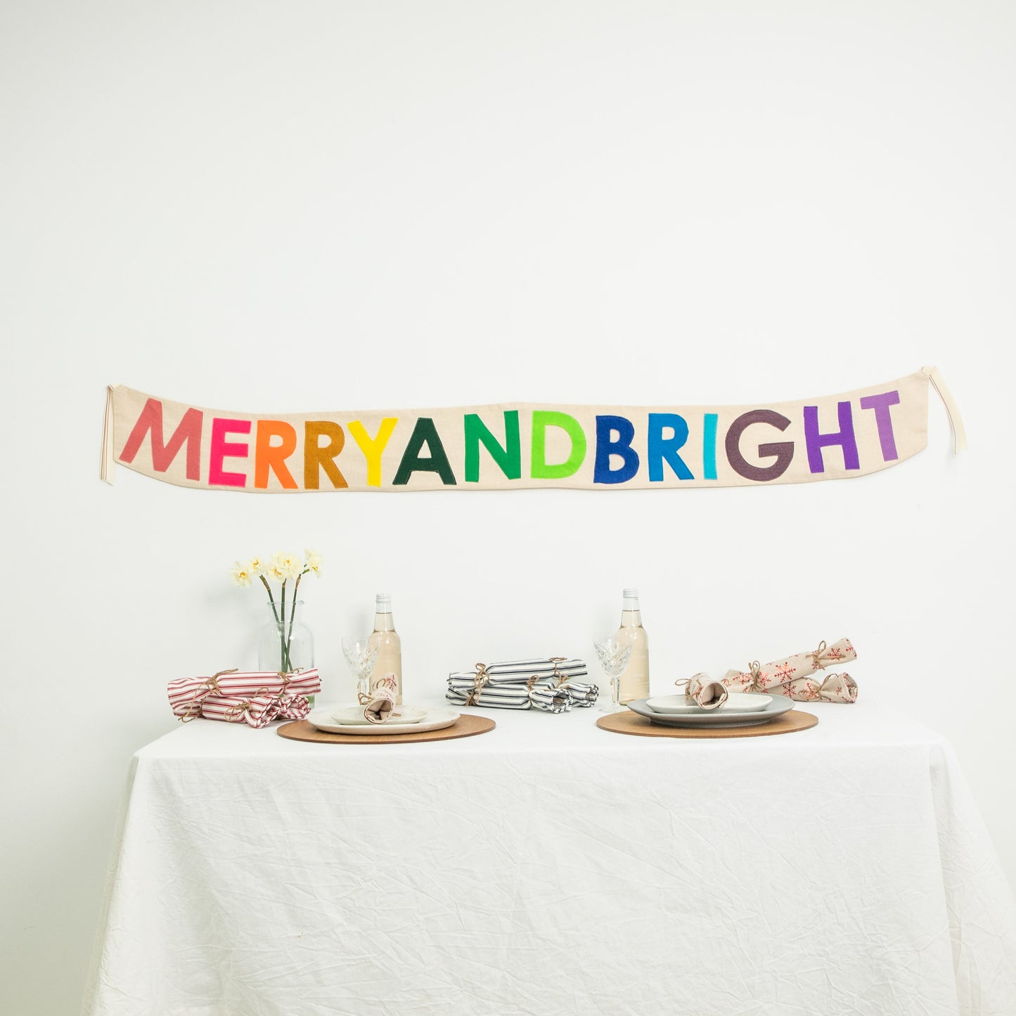 Felt Letter Banner - Merry and Bright hanging over table