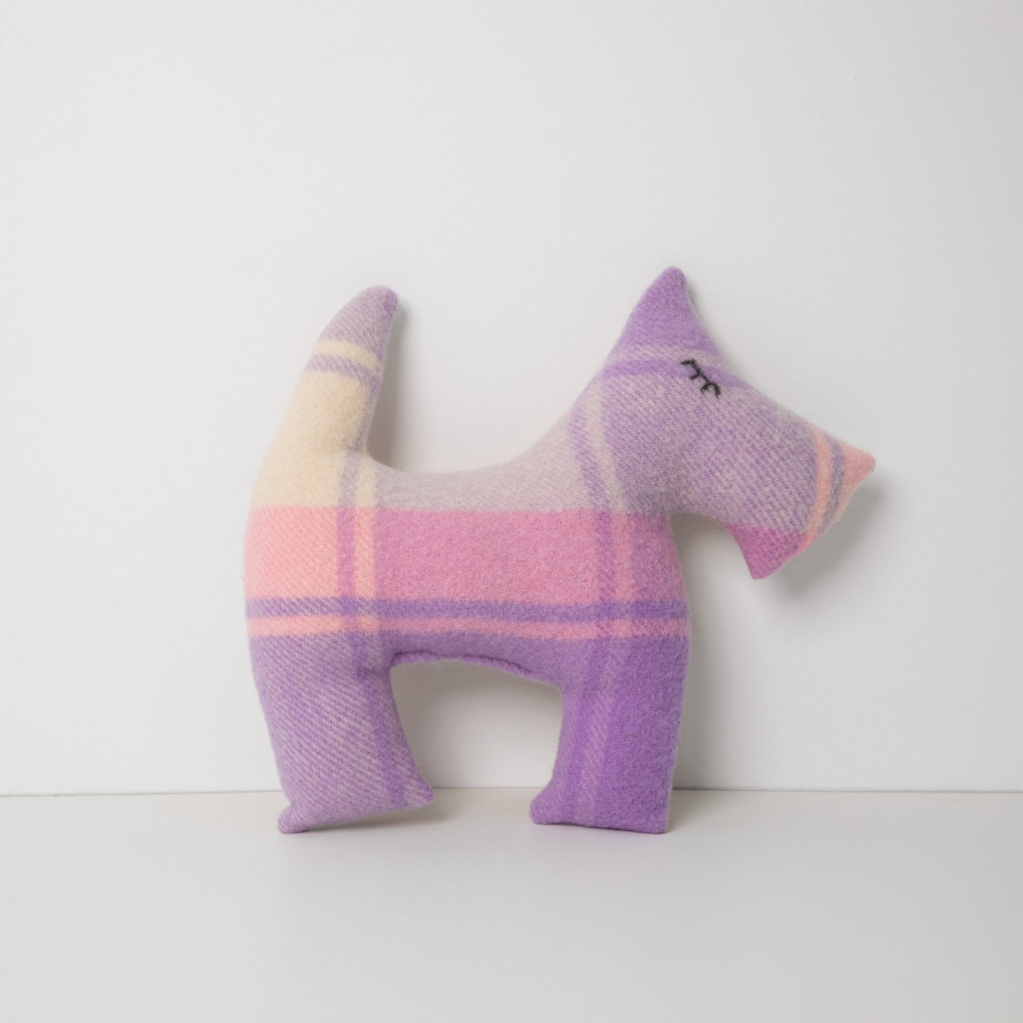 
                  
                    Purple Blanket upcycled to make this Scotty Dog, standing on white background
                  
                