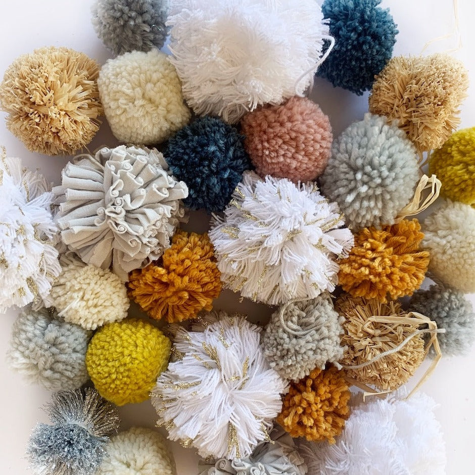 
                  
                    photo of various pompom colours, sizes and textures
                  
                